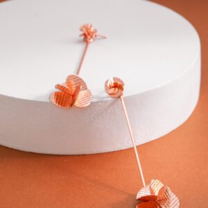 Aretes Hélice largos en oro rosa