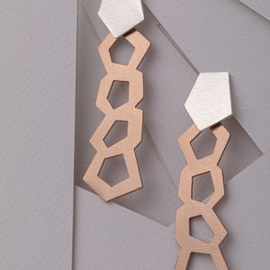 Aretes Symmetry Plata y Oro Rosa